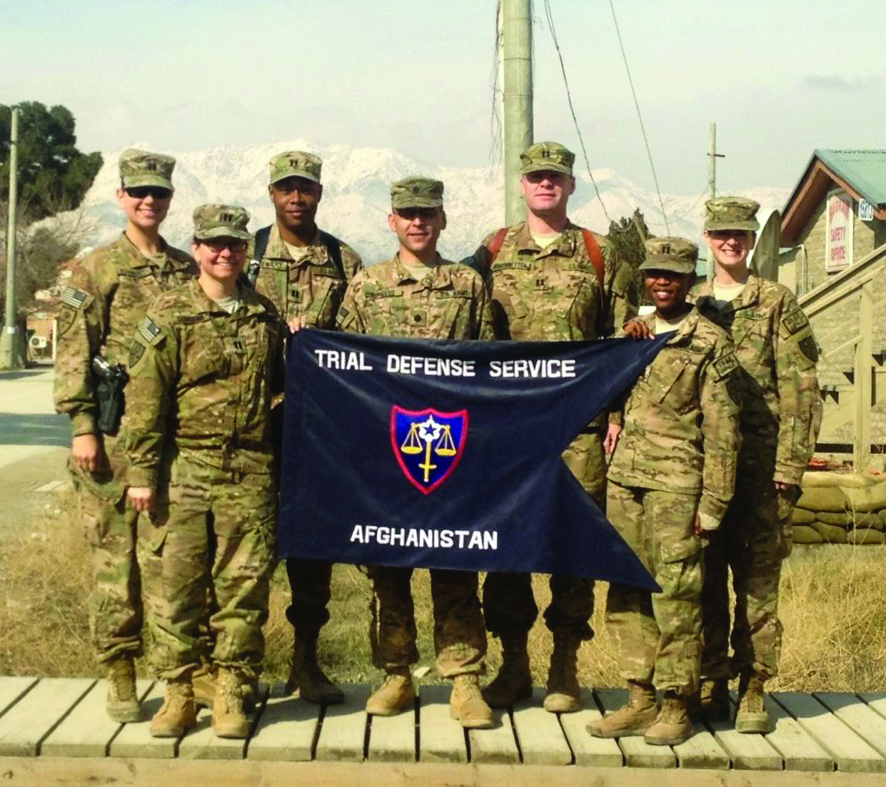 On 4 February 2014, members of Trial Defense
          Service (TDS–Region IX), gathered outside of the
          Bagram TDS office at Bagram Airfield for a weeklong regional training event. This was the last Region
          IX training conducted at Bagram Airfield. Shortly
          after the training, CPT Keith Stewart and CPT Wendy
          Schrank defended a Soldier at a fully-contested
          court-martial (panel case) at the Bagram Court,
          securing a full acquittal in the process. Pictured left
          to right: CPT Katherine Flowers (DC, Camp Phoenix
          Field Office), CPT Wendy Schrank (DC, Kuwait Field
          Office), CPT Keith Stewart (DC, Bagram Field Office),
          LTC Christopher Burgess (RDC, Bagram Field Office),
          CPT Jon Schoenwetter (SDC, Kuwait Field Office),
          CPT Jihan Walker (SDC, Kandahar Field Office), and
          MAJ Mary Meek (SDC, Bagram Field Office). 